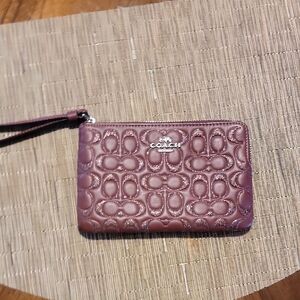 Coach Embossed Wristlet in Plum